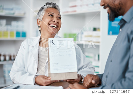Medicine, shopping or pharmacist helping a black man with healthcare advice on medical pills or drugs. Consulting, customer or happy senior doctor talking or helping a sick elderly person in pharmacy 127341647