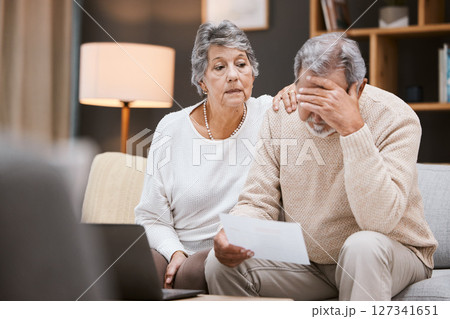 Stress, finance and senior couple planning retirement, mortgage anxiety and sad about pension paperwork. Depression, audit and elderly man and woman with a financial crisis and insurance mistake Stress, finance and senior couple planning retirement, mortgage anxiety and sad about pension paperwork. Depression, audit and elderly man and woman with a financial crisis and insurance mistake 127341651