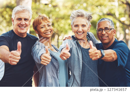 Senior fitness group, thumbs up and portrait with smile, diversity and happiness in park for wellness. Happy workout friends, retirement and hand gesture for motivation, teamwork and focus for health Senior fitness group, thumbs up and portrait with smile, diversity and happiness in park for wellness. Happy workout friends, retirement and hand gesture for motivation, teamwork and focus for health 127341657