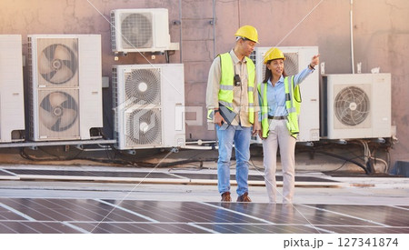 Solar panels, roof or engineering team planning photovoltaic construction for renewable energy development. Solar energy, innovation or engineers working on an industrial building or grid project Solar panels, roof or engineering team planning photovoltaic construction for renewable energy development. Solar energy, innovation or engineers working on an industrial building or grid project 127341874