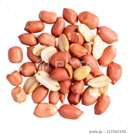 Close-up of a healthy brown heap of peanuts on a white background. 127342330