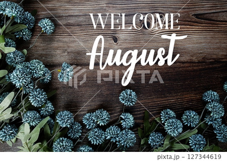 Welcome August text with flowers bouquet decoration on wooden background Welcome August text with flowers bouquet decoration on wooden background 127344619