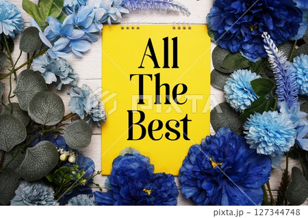 All The Best text with blue flowers bouquet decoration on wooden background 127344748