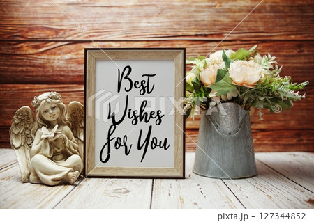 Best Wishes For You text on paper card with easel and elements decorated Best Wishes For You text on paper card with easel and elements decorated 127344852