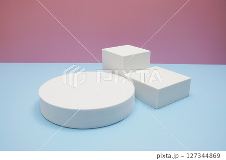 Podium display scene stage showcase front view with copy space on pink and blue background 127344869