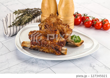 Baked beef ribs with marinade Baked beef ribs with marinade 127345021