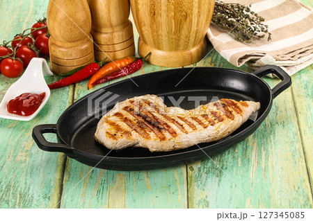 Grilled Turkey fillet breast served sauce Grilled Turkey fillet breast served sauce 127345085