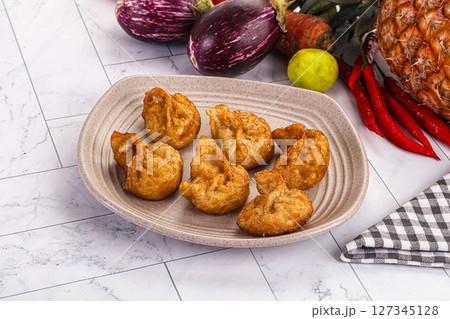 Tibetian fried momo stuffed dumplings 127345128
