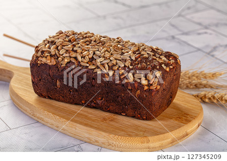 Browl rye bread with seeds Browl rye bread with seeds 127345209