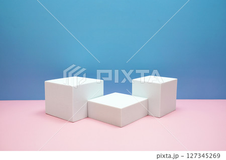 Podium display scene stage showcase front view with copy space on pink and blue background 127345269