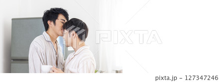Banner Happy gay couple enjoy breakfast in kitchen drinking coffee. Panorama Two best friends LGBTQ relation partner home cooking. Wide Happiness romance homosexual marriage lifestyle with copy space Banner Happy gay couple enjoy breakfast in kitchen drinking coffee. Panorama Two best friends LGBTQ relation partner home cooking. Wide Happiness romance homosexual marriage lifestyle with copy space 127347246