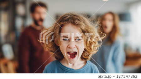 A child cries while parents argue in the background. The crying child highlights the emotional pain and turmoil caused by parental arguments. Generative AI. A child cries while parents argue in the background. The crying child highlights the emotional pain and turmoil caused by parental arguments. Generative AI. 127347862