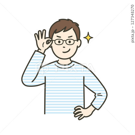 眼鏡を上げてニヤリと笑い自信を見せる若い男性 127348270