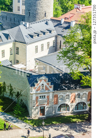 Historic castle building and charming yard in Tallinn Old Town, Estonia. High quality photo 127351700