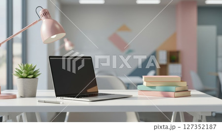 Modern Creative Workspace with Laptop Books and Succulent Plant 127352187