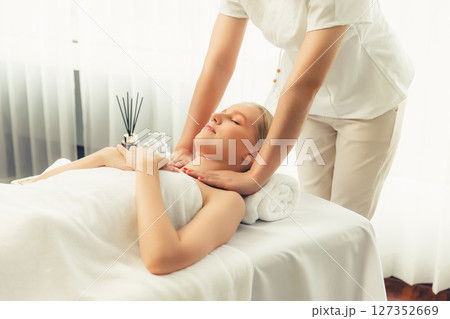 Caucasian woman customer enjoying relaxing anti-stress massage. Quiescent 127352669