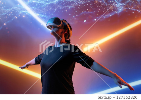 Woman with VR virtual reality goggles Woman with VR virtual reality goggles 127352820