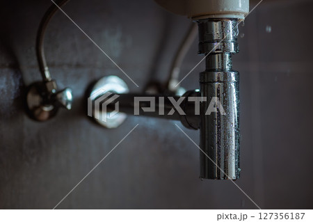 Leaky Drainpipe Under Sink Leaky Drainpipe Under Sink 127356187