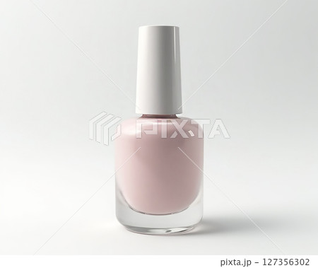 Elegant pale pink nail polish bottle on a clean white background showcasing its smooth finish and modern design 127356302