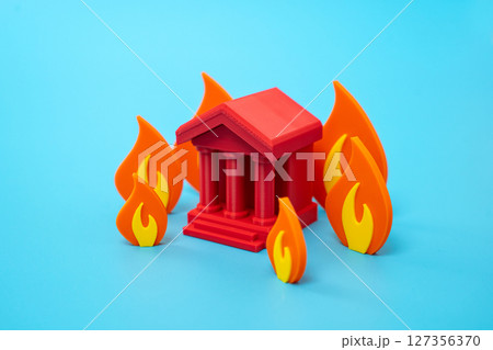 The bank building is on fire. The bank is at risk of bankruptcy. Failing institutions, economic risk, or unstable banking systems. Financial collapse, crisis, or bankruptcy. The bank building is on fire. The bank is at risk of bankruptcy. Failing institutions, economic risk, or unstable banking systems. Financial collapse, crisis, or bankruptcy. 127356370