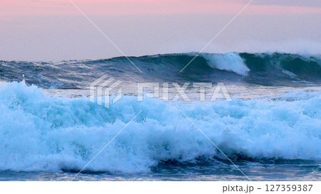 Tropical sea beach in summer time Purple sky on sunny day. Golden sand beach sea peaceful scenery on the beach. Travel vacation seaside outdoor. Ocean island beautiful dramatic Magenta landscape Tropical sea beach in summer time Purple sky on sunny day. Golden sand beach sea peaceful scenery on the beach. Travel vacation seaside outdoor. Ocean island beautiful dramatic Magenta landscape 127359387