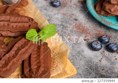 Chocolate shortbread cookies. Light background. Chocolate shortbread cookies. Light background. 127359944