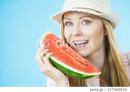 woman holding watermelon fruit 127360810