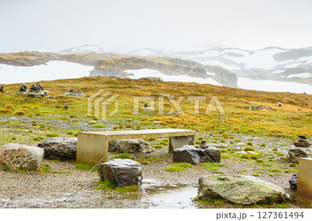 Camp site with picnic table in norwegian mountains Camp site with picnic table in norwegian mountains 127361494