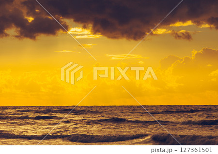 Beatiful sunset with clouds over the Baltic sea Beatiful sunset with clouds over the Baltic sea 127361501