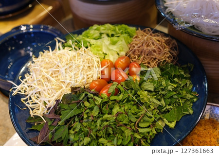 Bean sprouts vegetables Mung bean sprouts rotate close up. Rotating sprouted seeds of beans 127361663