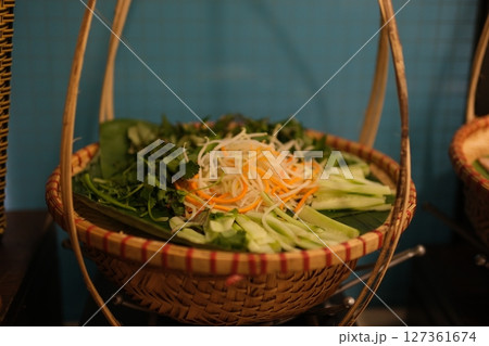 Basket vegetables sprouts fresh vegetables in baskets on a white wooden table. Concept of healthy eating, fresh vegetables. 127361674