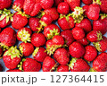background Juicy ripe strawberries. Sweet healthy dessert, vitamin harvest. close up. 127364415