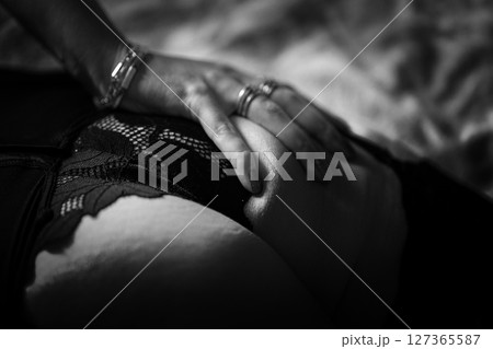 Part of a naked female body close-up. Body-positivity, self-love, acceptance. Concept of femininity and body care 127365587