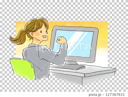 A woman laughing and giving a fist pump in front of a monitor A woman laughing and giving a fist pump in front of a monitor 127367631