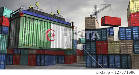 Cargo container with flag of Algeria lifted by crane at freight terminal - 3D illustration 127371996