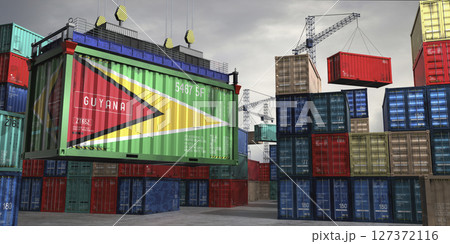Cargo container with flag of Guyana lifted by crane at freight terminal - 3D illustration 127372116