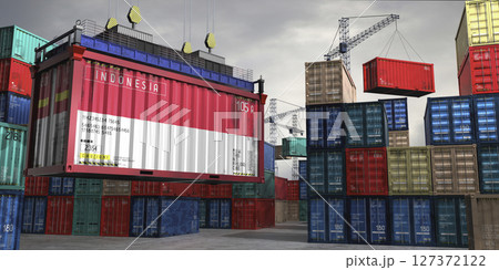 Cargo container with flag of Indonesia lifted by crane at freight terminal - 3D illustration Cargo container with flag of Indonesia lifted by crane at freight terminal - 3D illustration 127372122
