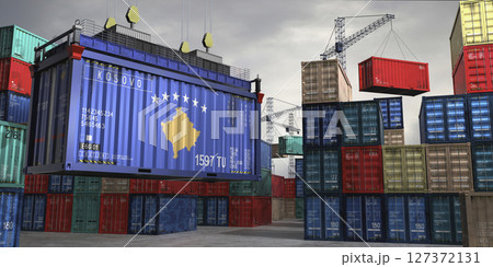 Cargo container with flag of Kosovo lifted by crane at freight terminal - 3D illustration Cargo container with flag of Kosovo lifted by crane at freight terminal - 3D illustration 127372131