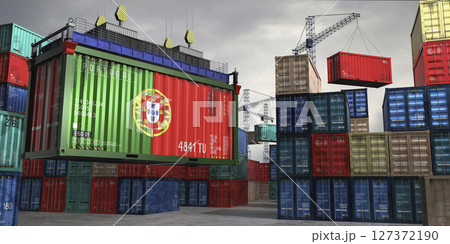 Cargo container with flag of Portugal lifted by crane at freight terminal - 3D illustration 127372190