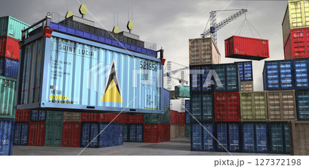 Cargo container with flag of Saint Lucia lifted by crane at freight terminal - 3D illustration 127372198