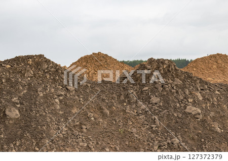 Soil on the ground as texture and background. 127372379
