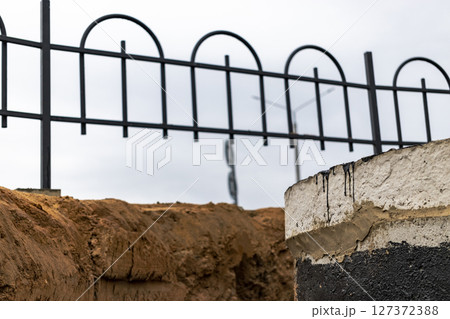 Installation of a reinforced concrete well for water supply and sewerage at the construction site. Installation of a reinforced concrete well for water supply and sewerage at the construction site. 127372388