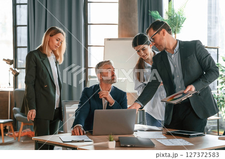 Group of business people are working in the modern office 127372583