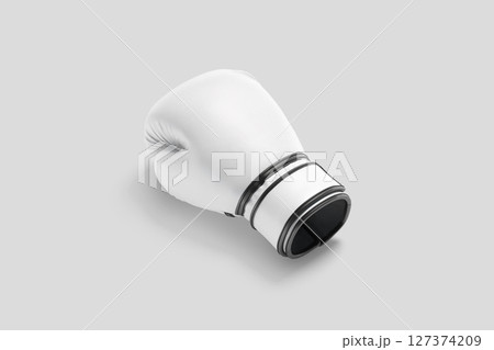 Blank white single boxing gloves mockup lying, grey background Blank white single boxing gloves mockup lying, grey background 127374209