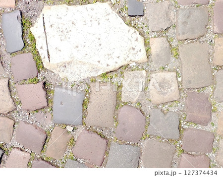 Cobblestones Create a Charming Path in the Old Town Highlighting Historic Charm and Character 127374434