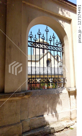 Charming View of the Armenian Cathedral Courtyard in Lviv With Wrought Iron Gate Charming View of the Armenian Cathedral Courtyard in Lviv With Wrought Iron Gate 127374491