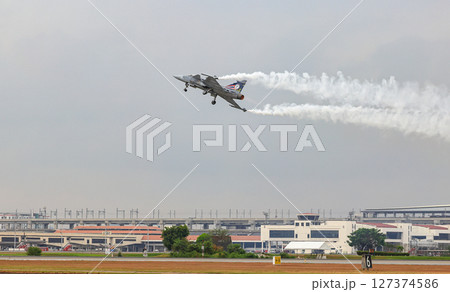 Saab JAS 39 Gripen light single-engine supersonic multirole fighter at airshow in Thailand. Saab JAS 39 Gripen light single-engine supersonic multirole fighter at airshow in Thailand. 127374586