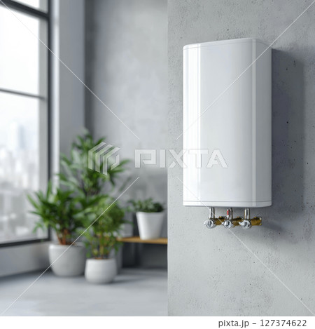 Modern water heater mounted on a concrete wall in a stylish interior with plants and natural light 127374622