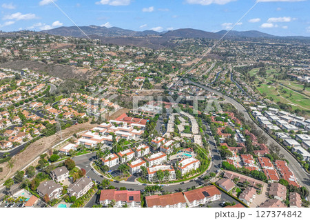 Aerial view of townnhouse condonium houses in Carlsbad, North County San Diego Aerial view of townnhouse condonium houses in Carlsbad, North County San Diego 127374842