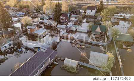 Floods on the planet, global warming. Climate change,natural disastersthe riot of nature. The apocalypse, catastrophes.Storms and destruction.The remnants of human life are floating in dirty water.End 127375469